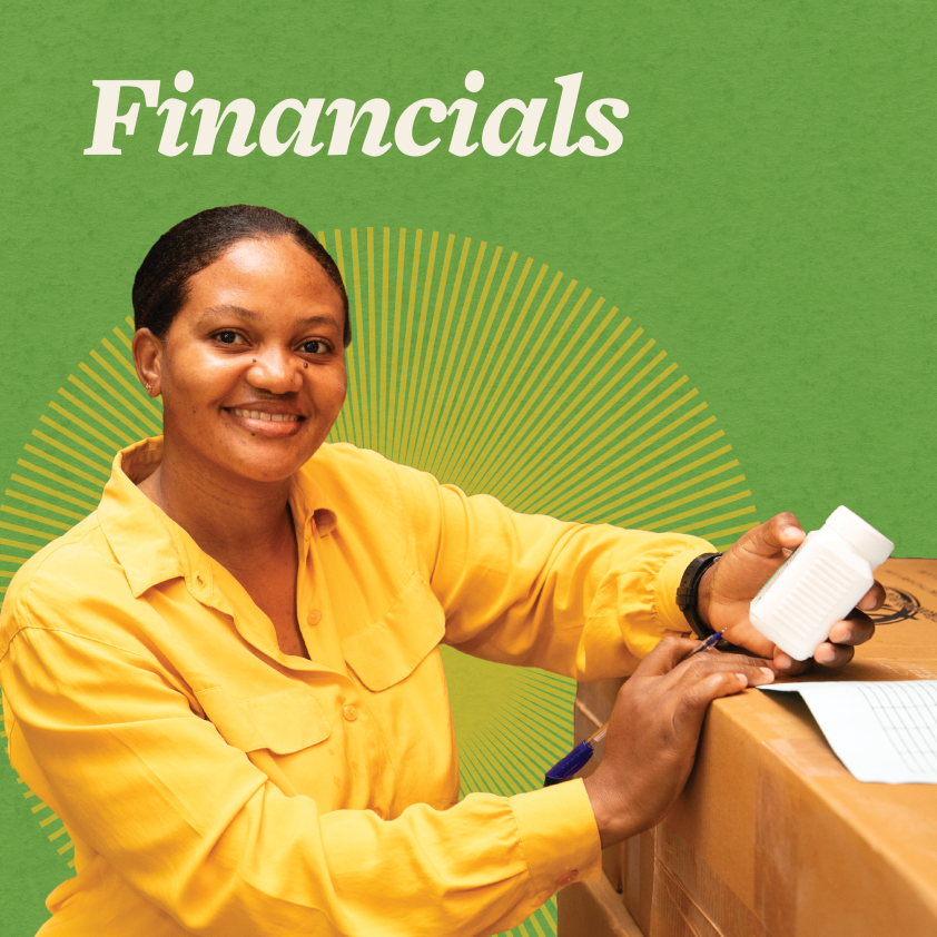 A woman Haitian warehouse worker smiles as she unpacks a box. The background is bright greenw with a bright yellow starburst design. The word "Financials" is written in the top left corner.