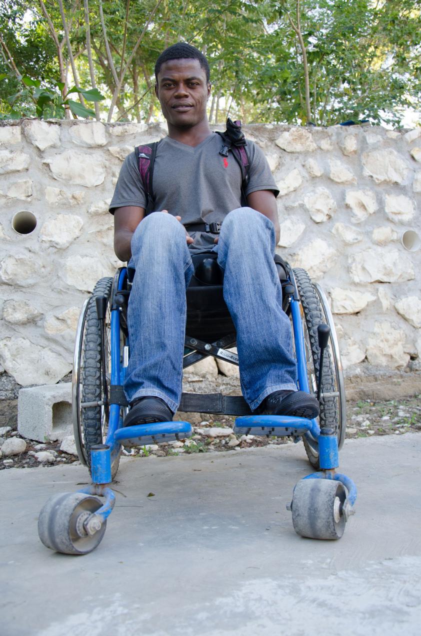 Maxsony in wheelchair smiling