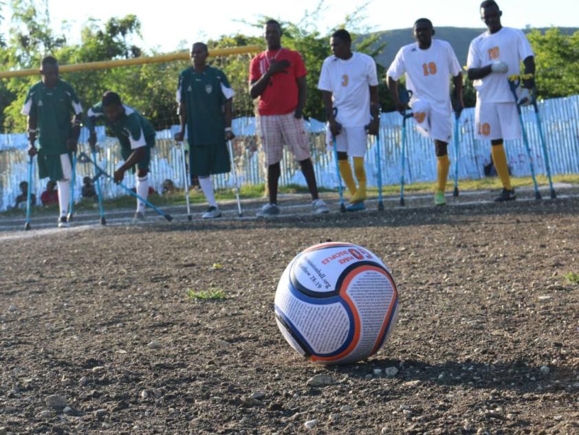 Singing the national anthem before the start of the soccer match, IDPD 2017