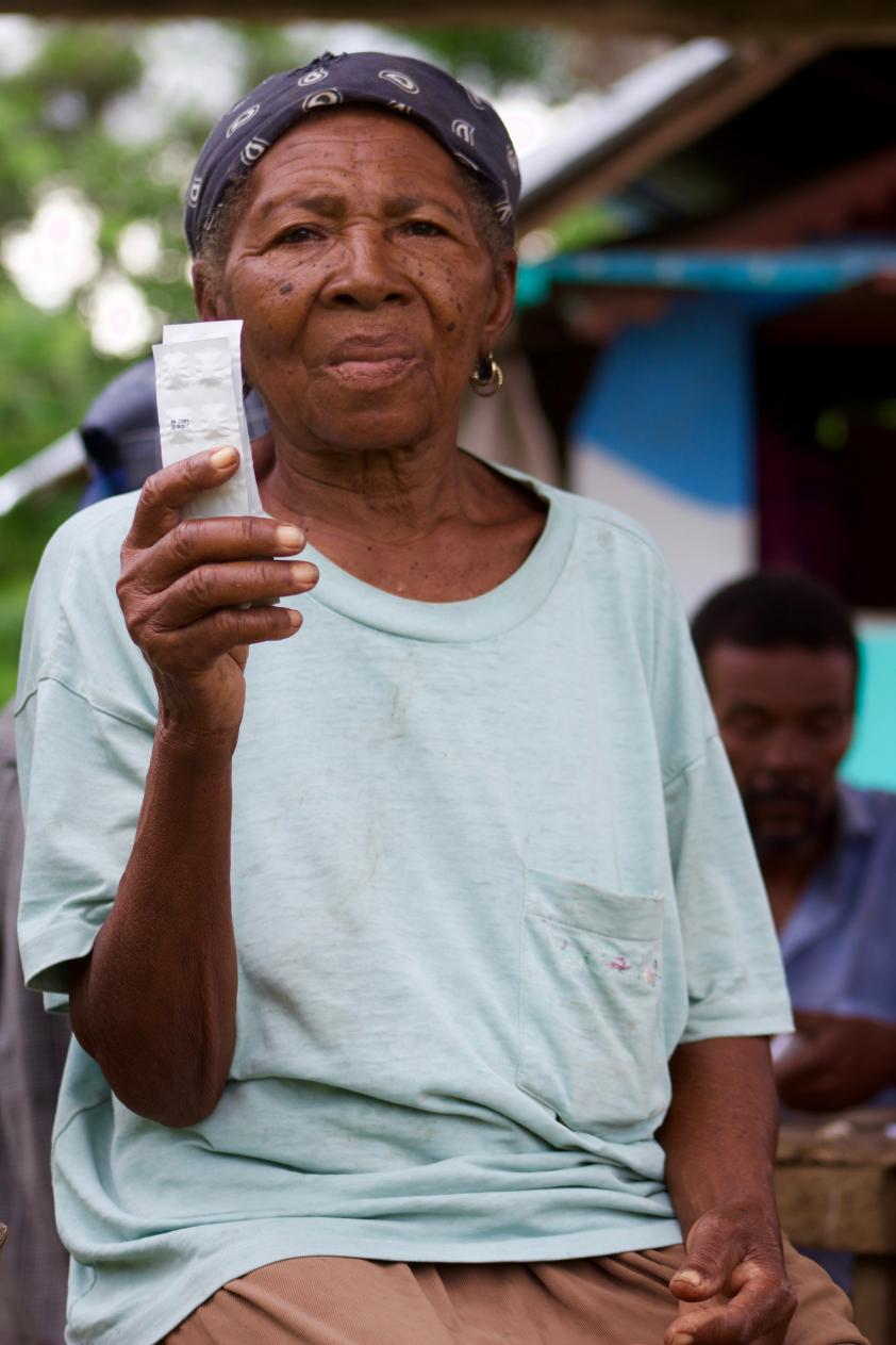 Woman holding cholera medication
