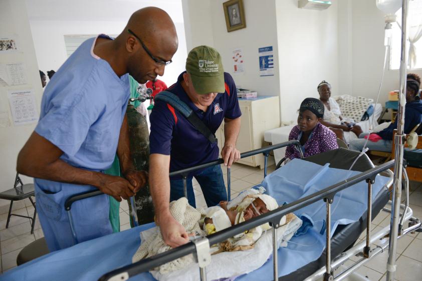 Drs. Ward and Theodore check on baby Lucia