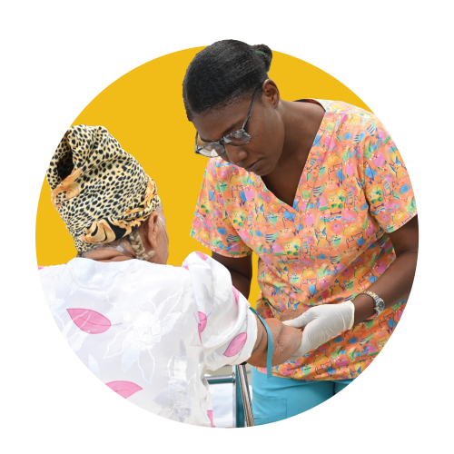 A Haitian woman nurse and her patient superimposed on a bright yellow circle.