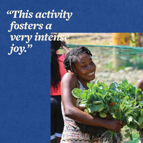 A Haitian woman smiles as she holds a big bundle of seedlings, overlaid with the text "This activity fosters a very intense joy."