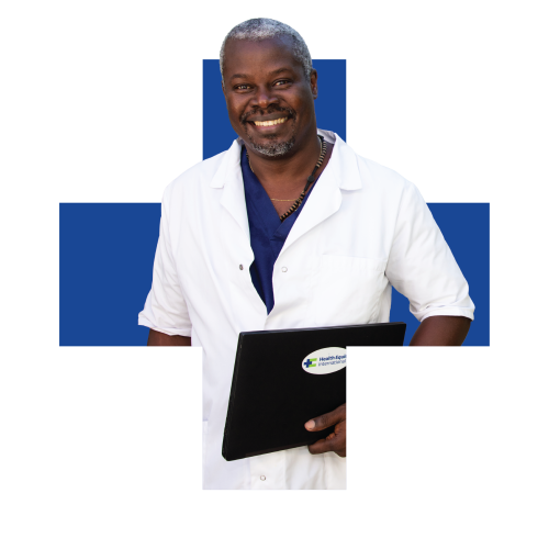 A Haitian male doctor superimposed on a dark blue plus sign.