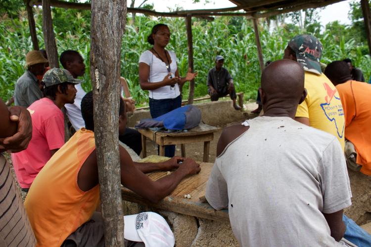 Nurse teaching people in town about cholera