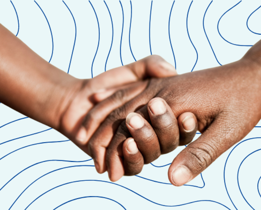 A photo of two dark-skinned hands holding one another on top of a light blue background with thin dark blue topographic lines.