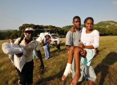 Fabienne Jean (Spinal Cord Injury Patient) being carried off of a helicopter