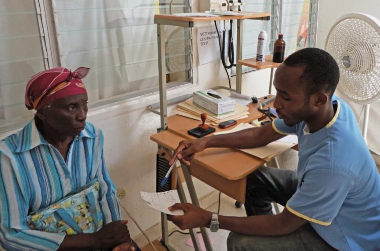 A doctor talking with patient