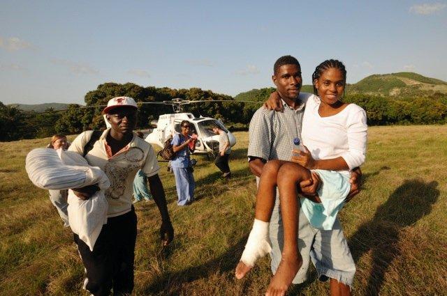 Fabienne Jean (Spinal Cord Injury Patient) being carried off of a helicopter
