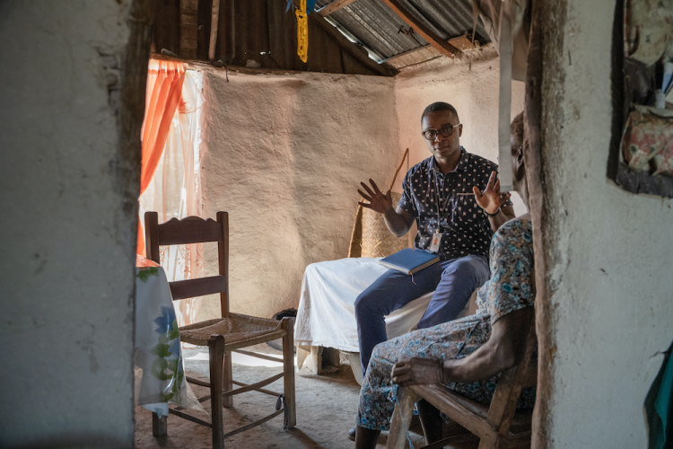 SBH social worker Junior Oscar visits Marie in her home.