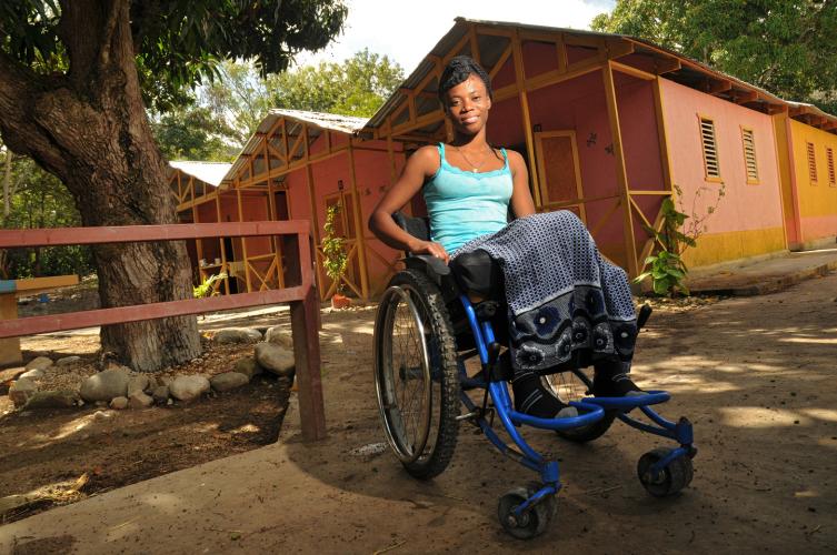 Woman in wheelchair smiling