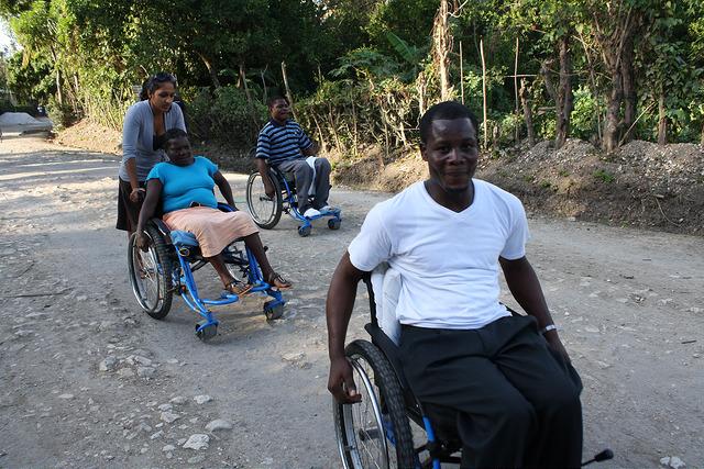 Two men in wheelchairs