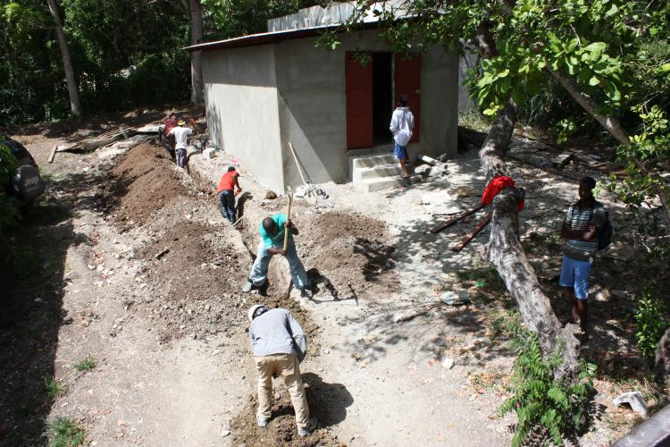 Workers digging