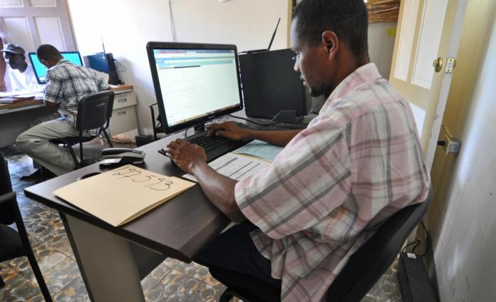 St. Boniface employee working at a computer