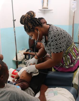 Dr. Mirielle Bien-Aimé working in SBHF's emergency department