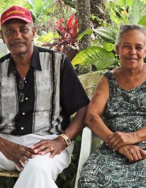 Fond des Blancs residents Jeanine Buissereth and Robert Gachelin sitting